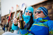 © Sergey Mironov - Photo of cheerful man and woman in sunglasses with beer on winter day