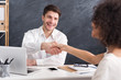 © Prostock-studio - Lawyer and client shaking hands after signing contract