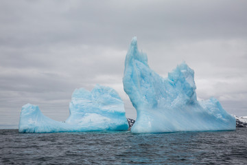 ice in the Antarctica with iceberg in the ocean