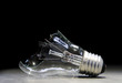 © ZETHA_WORK - Broken Lightbulb on Stone floor, Bad Idea Concept, Solution background