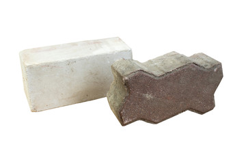 Building, one silicate white brick, one brown paving stones of concrete isolated on white background.