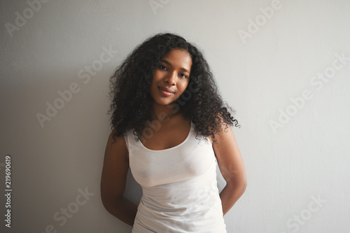 Isolated Shot Of Attractive Charming Young African American Woman