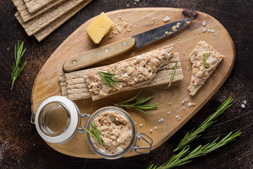 Wall Mural - Tuna pate with egg, cheese in jar and crispy bread. Fish rillette, healthy snack, diet food