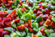 Food Background, Texture. Vegetarian Useful Mixture. Chopped Bell Peppers Of Different Colors: Red, Green, Yellow, Black. Fresh Vitamins And Antioxidants, Sweet Peppers, Vegetables 