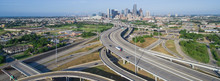 Panorama Aerial View Houston Downtown And Interstate 69 Highway With Massive Intersection, Stack Interchange And Elevated Road Junction Overpass At Early Morning From The Northeast Side Of Houston, US