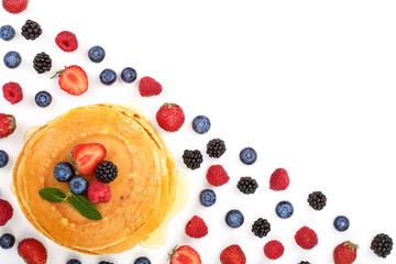 Wall Mural - Pancakes stack with different berries isolated on white background with copy space for your text. Top view. Flat lay