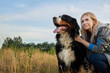 © Alex - portrait of a big dog and a girl in nature. the hostess with the pet look aside