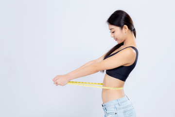 beautiful portrait asian woman diet and slim with measuring waist for weight isolated on white background, girl have cellulite and calories loss with tape measure, health and wellness concept.