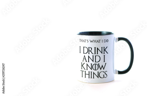 Fotografía I drink and I know things quote coffee mug on white background.