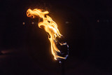 Fototapeta  - Burning Torch in the Night at black background