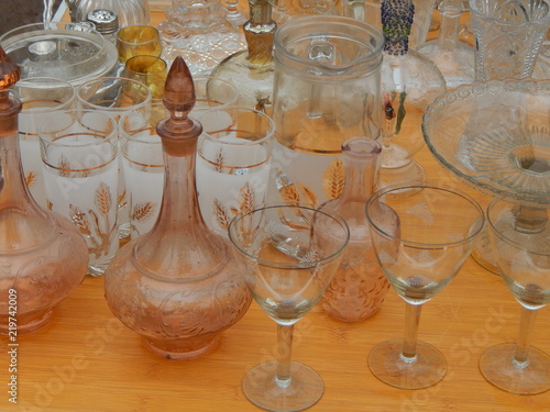 Selection Of Vintage Glassware On The Flea Market Vases Glasses