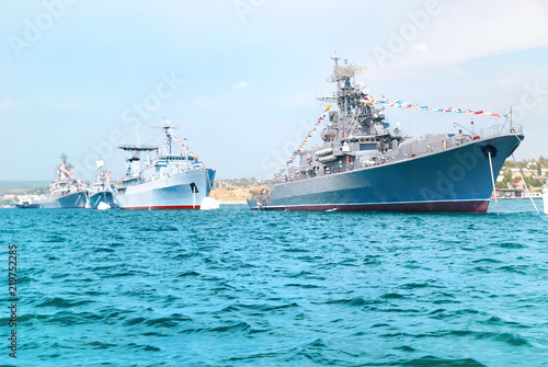 Tela Military navy ships in order on blue sea
