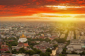 Wall Mural - Bangkok skyline while sunset with Wat Saket temple view.