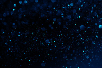 Wall Mural - Glitter sparkles blue abstract background