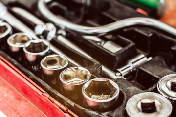 Cose-up of old toolbox. Toolset with interior compartments to keep wrenches for repair work.