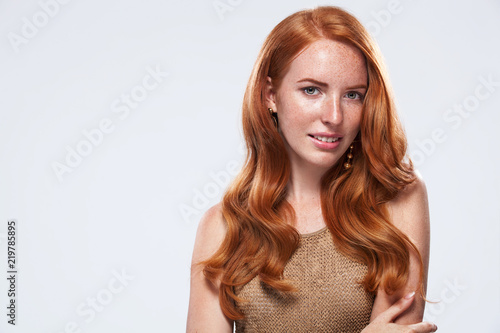 Red Head Girl With Long And Shiny Wavy Hair Beauty