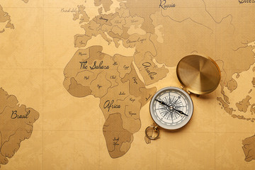 Sticker - Vintage compass on world map