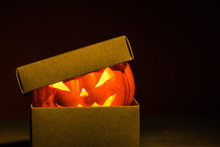 Close-up Of Halloween Pumpkin In Mysterious Craft Box