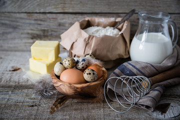 Wall Mural - Baking ingredients on rustic wood background