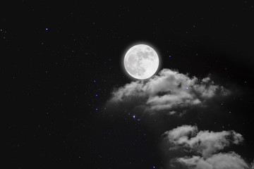 Wall Mural - romantic night. full moon over cloudscape with wood background.