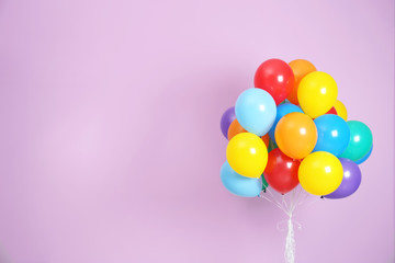 bunch of bright balloons and space for text against color background