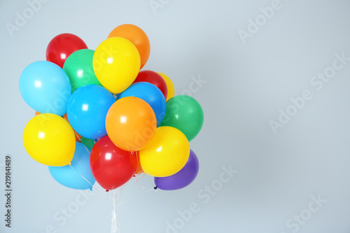 Cuadros en Lienzo Bunch of bright balloons and space for text against white background