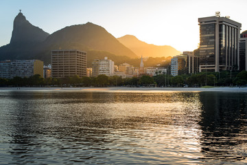 Fototapete - Corcovado Mountain by Sunset View, with Buildings of Botafogo District, in Rio de Janeiro
