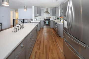 Stunning kitchen design with grey cabinets.