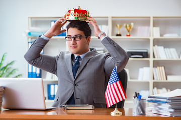 Businessman with American flag in office