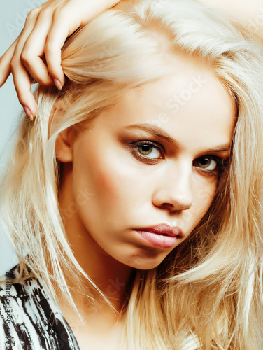 Young Pretty Woman With Blond Hair On White Background Sensual