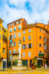 Wall Mural - View of a narrow street in the center of Grasse, France