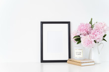 White Portrait Frame Mock Up With A Pink Peonies Beside The Frame, Overlay Your Quote, Promotion, Headline, Or Design, Great For Small Businesses, Lifestyle Bloggers And Social Media Campaigns. Poster