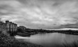 © ADDICTIVE STOCK - Monochrome view of lake under bridge in nature