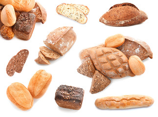 Different tasty fresh bread on white background