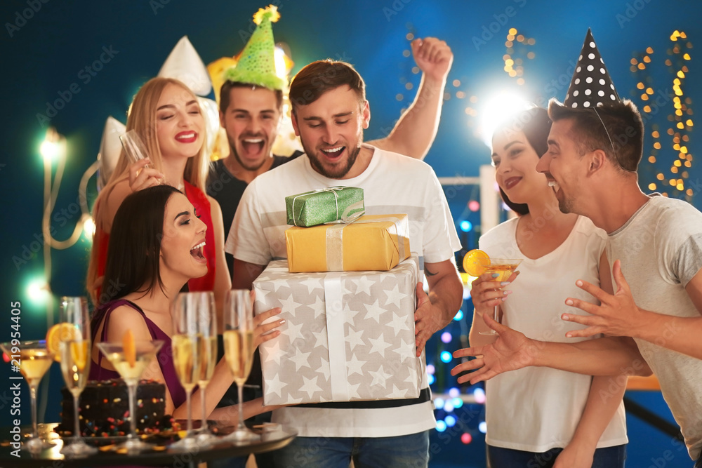 Young people at birthday party in club