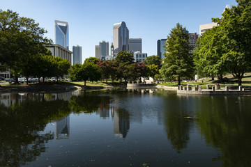 Wall Mural - Downtown uptown Charlotte, North Carolina as viewed from Marshall Park on a clear summer day