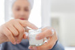 © focusandblur - Woman holding cream