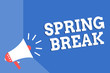 © Zofia - Handwriting text writing Spring Break. Concept meaning Vacation period at school and universities during spring Megaphone loudspeaker blue background important message speaking loud