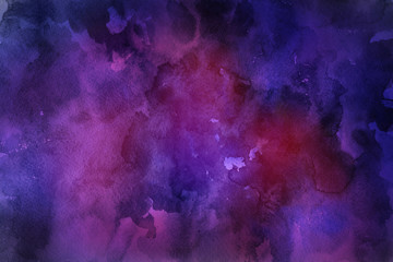 Colorful watercolor ombre leaks and splashes texture on white watercolor paper background. Natural organic shapes and design.