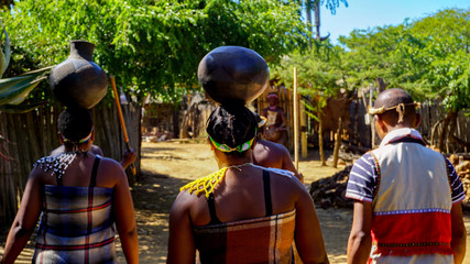 African Zulu, Xhosa, Tribe People wearing African traditional clothes and dancing, South Africa