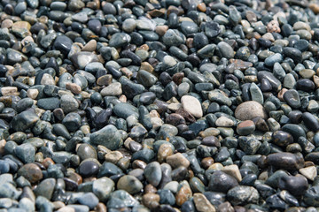 Background of stones on the beach