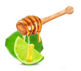 Poster - lime and dripping honey isolated on a white background