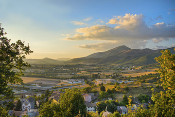 A picturesque view of Monte Cucco from Fossato di Vito in beautiful golden light at sunset. Italy, Umbria.