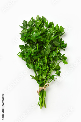 Fotomural A bunch of parsley isolated on white background