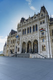 Fototapeta Paryż - view of the famous building of the Hungarian parliament in Budapest on the blue sky background