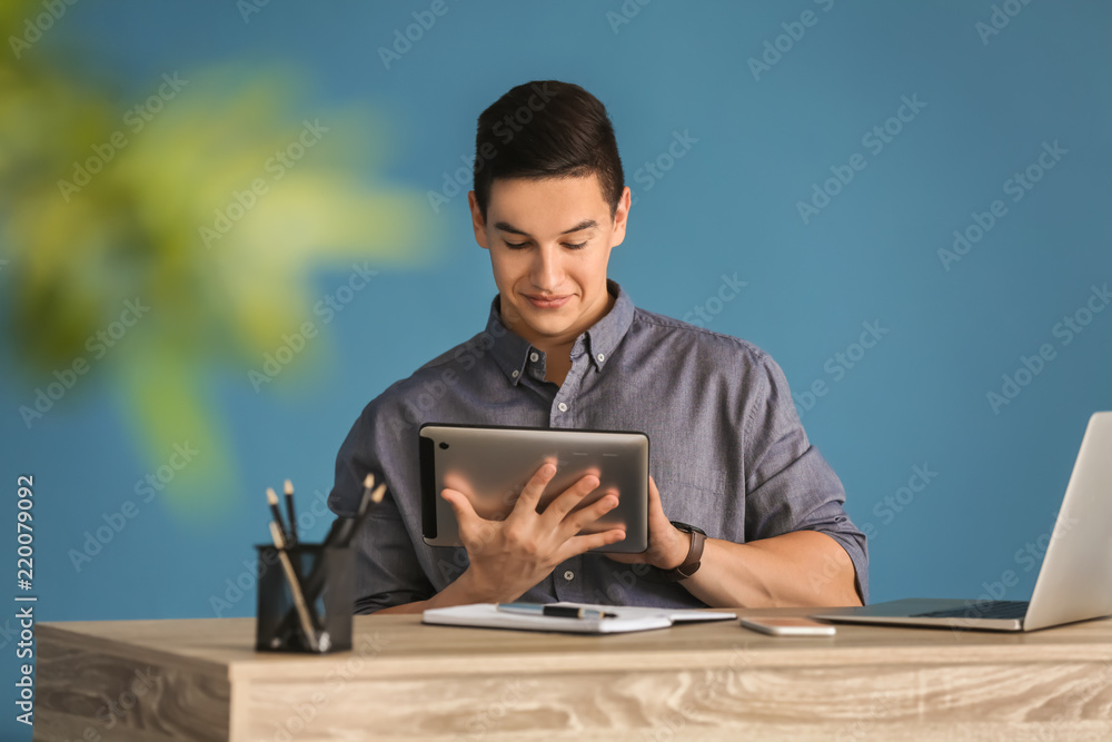 Young freelancer working at home