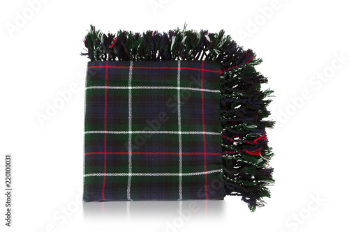 Fotografie, Obraz Scotland kilt in check black color dress of men’s, which is a rectangular length of cloth worn over the left