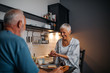 © bernardbodo - Older people eating in kitchen