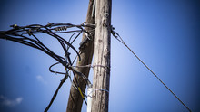 A Wooden Telephone Pole And Wire, Soweto, Johannesburg, South Africa