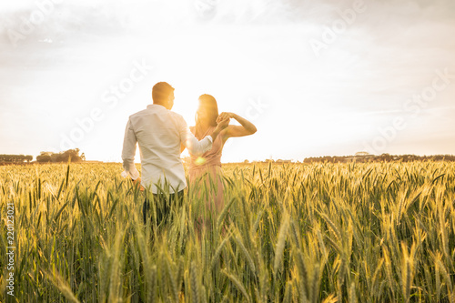 Fotografija Romantic Couple Dancing on Love Moment at gold wheat field